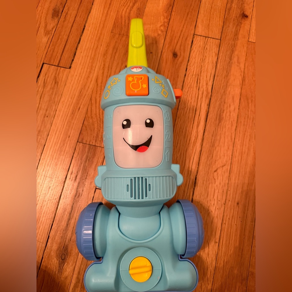 Fisher-Price Light Blue Musical Push Robot with Yellow Handle and Orange Accent